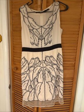 White Sleeveless Dress with Black Leaf Embroidery